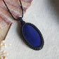 Lapislazuli Anhänger in dunklem Makramee